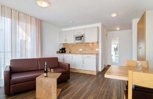 Immenstaad am Bodensee Apartment | Apartment 'Typ A2 2 Obergeschoss Nummer 13' with Shared Terrace, Shared Garden and Wi-Fi