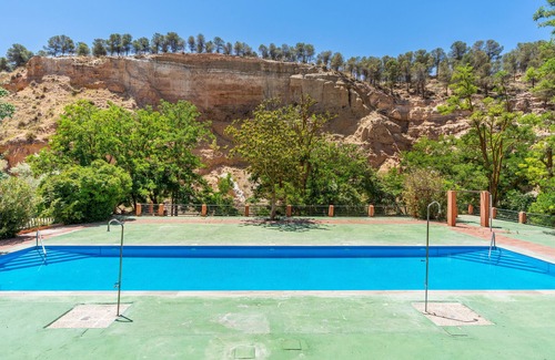 Guadix Apartment | Apartment 'Cueva Luna' with Mountain View, Shared Pool and Wi-Fi