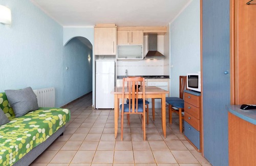 Castelldefels Apartment | Apartment 'Denis Playa 107' near the beach with sea view, Wi-Fi, balcony and terrace.