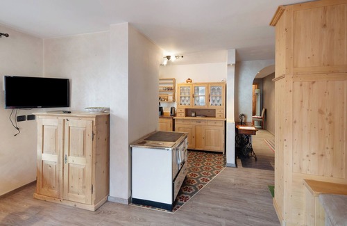 Canazei Apartment | Apartment 'Giulia' with Mountain View, Shared Garden and Balcony