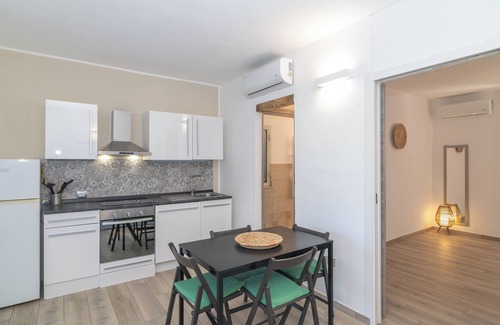 Porto San Paolo Apartment | Apartment 'Il Piccolo Rifugio' with Private Terrace, Private Garden and Air Conditioning