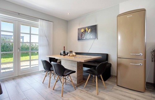 Krummin Apartment | Apartment 'Komfortables Ferienhaus Hafen' with Private Terrace, Private Garden and Wi-Fi