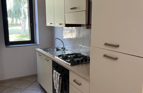Palmi Apartment | Apartment 'La Quiete - Gazebo Esterno 1' with Shared Pool, Wi-Fi and Air Conditioning