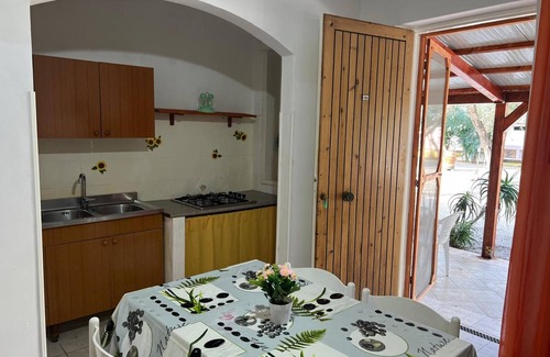 Calimera Apartment | Apartment 'La Quiete - Veranda Grande 2' with Shared Pool, Wi-Fi and Air Conditioning
