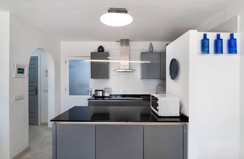 Playa Blanca Apartment | Apartment "Puerto Chico Q" with Sea View, Shared Pool, Terrace, A/C & Wi-Fi
