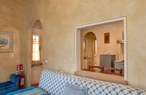 Montelopio Apartment | Apartment 'San Giovanni Residence 1 Dantea' with Private Garden, Wi-Fi and Air Conditioning