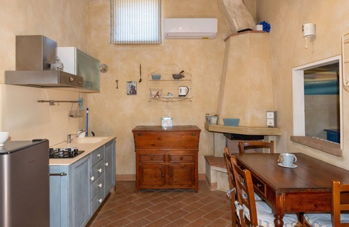 Montelopio Apartment | Apartment 'San Giovanni Residence 1 Dantea' with Private Garden, Wi-Fi and Air Conditioning
