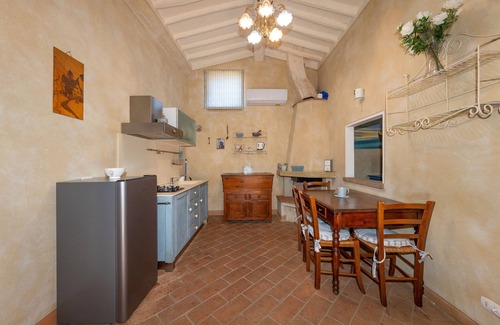 Montelopio Apartment | Apartment 'San Giovanni Residence 1 Dantea' with Private Garden, Wi-Fi and Air Conditioning