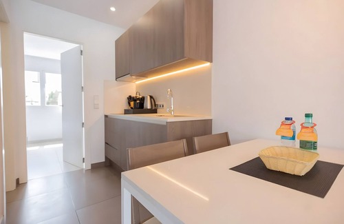 Cala Agulla Apartment | Apartment 'Standard 19' with Shared Pool, Wi-Fi and Air Conditioning