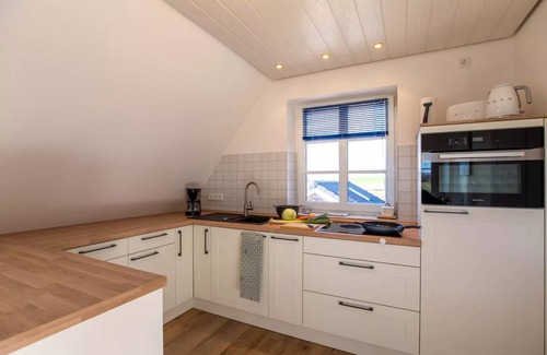 Pellworm Apartment | Apartment 'Urlaub An Der Nordermühle' with Shared Garden and Wi-Fi