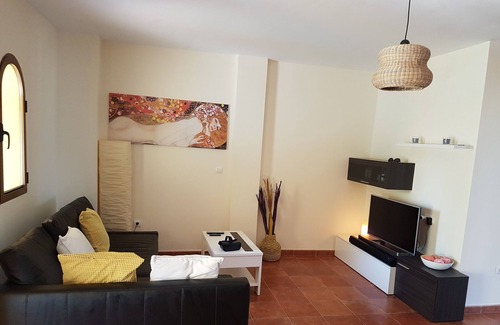 Los Puertos Condo | Apartment with large garden and air conditioning