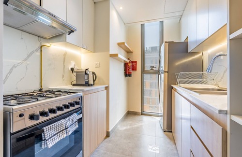 Dubai Production City Apartment | Apartment with Lush Green Views, Minutes to City Centre Meaisem and Butterfly Gardenby Deluxe Holiday Homes