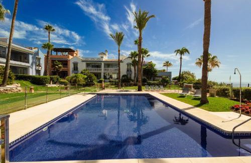 Bahia de Casares Apartment | Apartment, with private terrace and in beachfront urbanization with heated pool, in Casares Costa