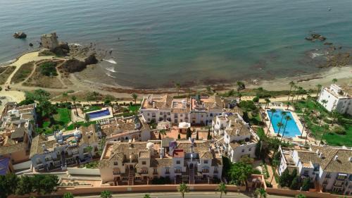 Bahia de Casares Apartment | Apartment, with private terrace and in beachfront urbanization with heated pool, in Casares Costa