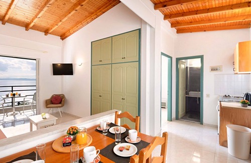 Barbati Apartment | Apartment with sea views in complex with pool and restaurant.