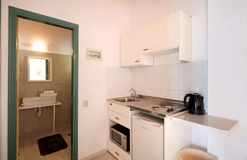 Barbati Apartment | Apartment with sea views in complex with pool and restaurant.