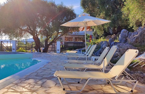 Barbati Apartment | Apartment with sea views in complex with pool and restaurant.
