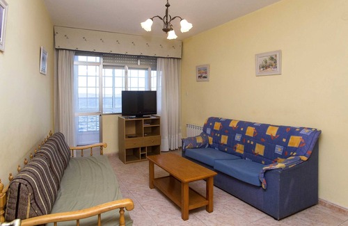 Bueu Apartment | Apartment with terrace and sea views on the beachfront
