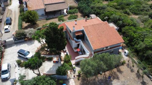 Porto Torres Apartment | Appartamento in Villa con giardino (2)
