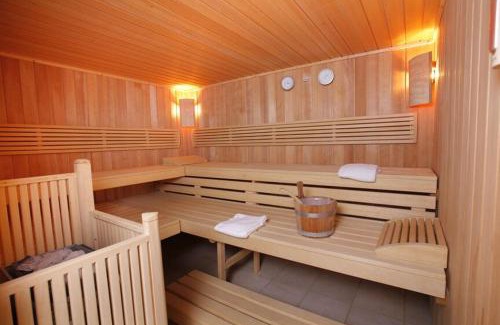 Levernois Apartment | Appartement détente, piscine - sauna - vue sur le golf