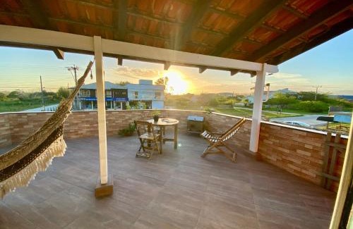 Laguna Apartment | Aptos exclusivos com varanda ou terraço com Pôr do sol, cozinha privativa e equipada, Wi-Fi 600MBs, a 700m da praia de Itapirubá e 1km da BR-101