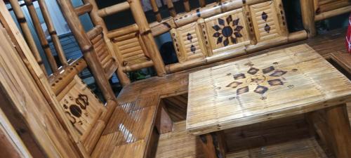 San Juan Bed & Breakfast | Aremen Transient, Nipa Hut with shared main houses bathroom