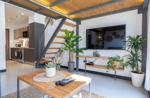 Jumeirah Village Apartment | Aria G08 JVC · Tropical Loft with working station in JVC