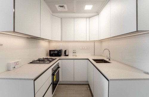 Jumeirah Village Circle Apartment | Art of Modern Illumination
