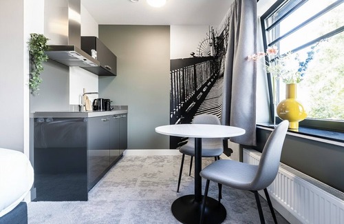Centrum Apartment | Artist-inspired suite for 2 with king bed, private kitchen, air conditioning, and modern comforts. Perfect for couples, solo travelers, or business stays.