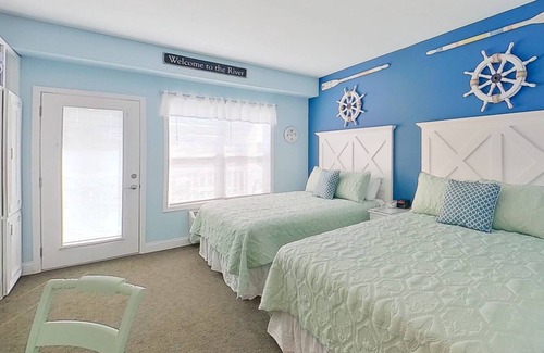 Southport Condo | Ask about low weekly rates - Amazing Water & Sunset Views- Just Blocks From Southport! Gorgeous Pool