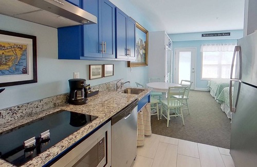 Southport Condo | Ask about low weekly rates - Amazing Water & Sunset Views- Just Blocks From Southport! Gorgeous Pool