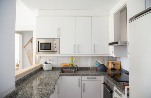 Poris de Abona Apartment | At sea level, and overlooking the beach. Apartment with terrace and 8 hrs of sun