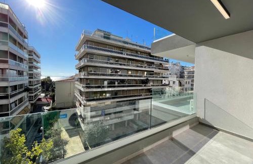 Palaio Faliro Apartment | Athenean Modern Escape near Marina Floisvos
