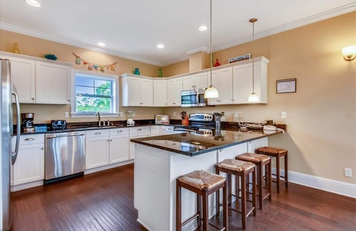 Sea Palm Village House | ATTITUDE ADJUSTER IS THE PERFECT FAMILY GETAWAY! Tucked away on over an acre of land.