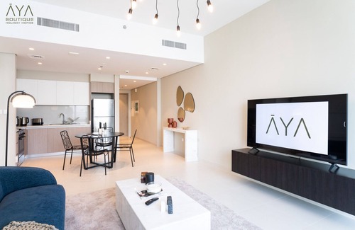 Dubai Apartment | Aya - Elegant 1BR Apartment With Balcony and Creek Views