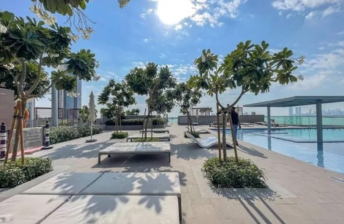Dubai Apartment | Aya - Elegant 1BR Apartment With Balcony and Creek Views