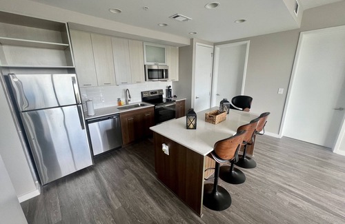 Westside Condo | Bachelor Suites W/Stadium Views