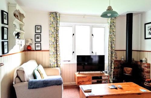 Burgh Island Ski Chalet | Badgers Den, a beautiful log cabin in a secluded valley close to the beach