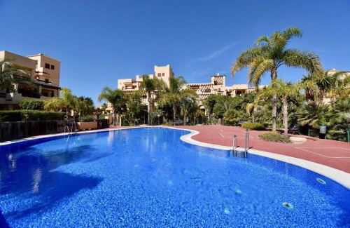 Puerto Rey Apartment | Bahia Marinas - Tu hogar con jardín privado!