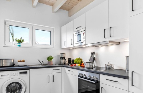 Busum House | Bajo Lykke - close to the beach and the North Sea, fireplace, infrared sauna, terrace