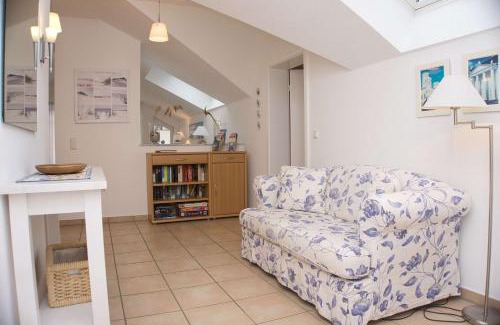 Gohren Apartment | Balkon mit traumhaften Meerblick, gratis Nutzung vom AHOI Erlebnisbad und Sauna in Sellin Dünenhaus FeWo05