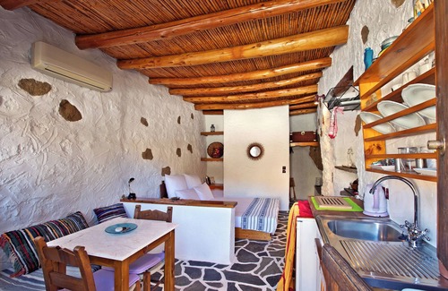 Aspros Potamos Cottage | "Bamboo" 300 years old cottage "Natura cottages private garden for nature lovers
