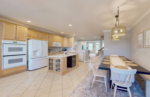 Sunset Island House | Bay view townhome with multiple decks, pool & gym - walk to the beach