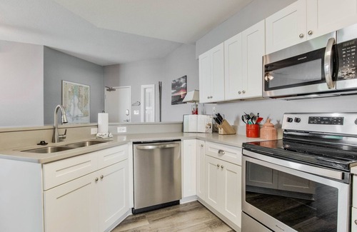 Fort Morgan Condo | Bayfront Bliss: Top-Floor Condo with Stunning Views