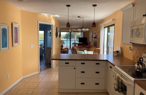 Englewood Condo | Beach condo with Gorgeous Waterfront Views, Pool, and Fishing Pier!