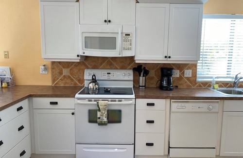 Englewood Condo | Beach condo with Gorgeous Waterfront Views, Pool, and Fishing Pier!