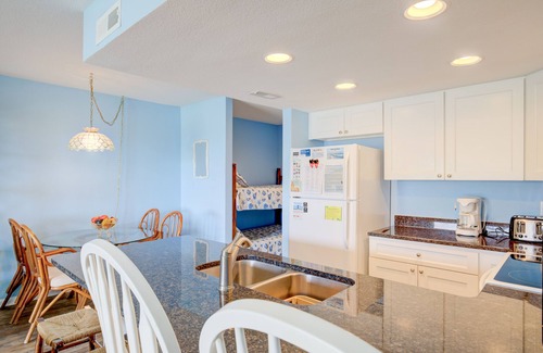 Surf City Condo | Beach condo with pool, sundecks, outdoor showers & direct beach access