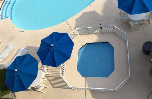 Kill Devil Hills House | Beach Front Condo @ Outer Banks Beach Club, 3 Pools, closest to beach, & shops