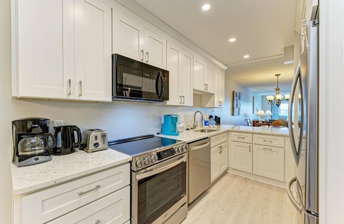 Bradenton Beach Condo | Beach Palms 6B-Beach 1 Minute WalkHeated Pool-Free Wi-Fi-Dock-Surrounded By Wate