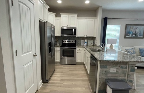 Thomas Drive House | Beach themed 3 bedroom 2 bath townhome with pool view